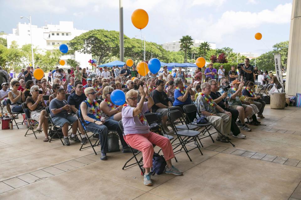 Same sex marriage supporters attend an "All You Need is Love" rally at the Hawaii State Capitol in Honolulu