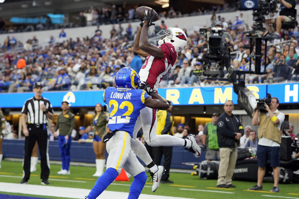 Arizona Cardinals wide receiver A.J. Green, top, makes a touchdown catch over Los Angeles Rams cornerback David Long Jr. (22) during the first half of an NFL football game Sunday, Nov. 13, 2022, in Inglewood, Calif. (AP Photo/Jae C. Hong)