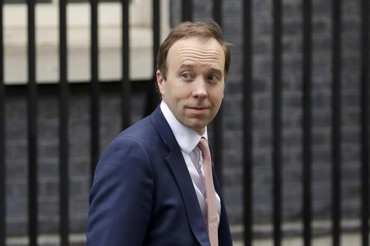 FILE - In this Thursday, April 30, 2020 file photo, the then British Health Secretary Matt Hancock leaves 10 Downing Street in London, Thursday, April 30, 2020. Former U.K. Health Secretary Matt Hancock, who led Britain's response to COVID-19 in the first year of the pandemic, was suspended by the Conservative Party on Tuesday, Nov. 1, 2022 after signing up to a reality TV show. (AP Photo/Matt Dunham, File)