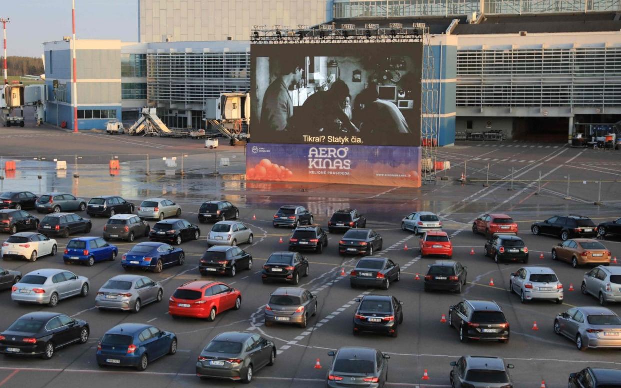 A drive-in cinema at Vilnius airport in Lithuania this week - AFP