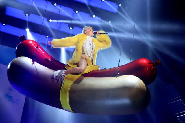 <p>Marco Piraccini\Archivio Marco Piraccini\Mondadori via Getty</p> Miley Cyrus on the Bangerz Tour in June 2014