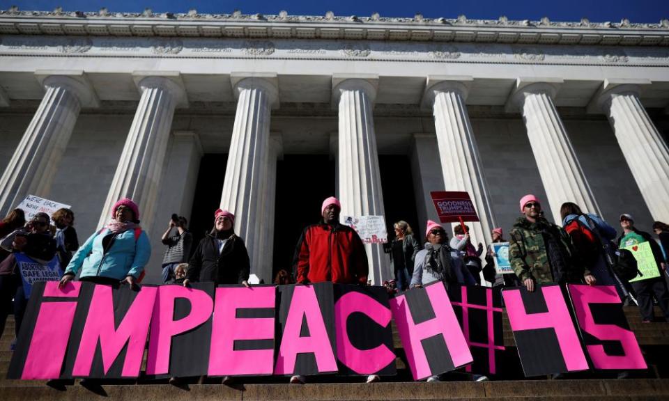 People participate in the second annual Women’s March in Washington.