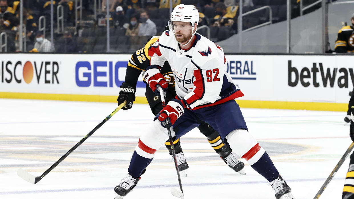 BOSTON, MA - MAY 19: Washington Capitals center Evgeny Kuznetsov (92) looks to the wing during Game 3 of the NHL Stanley Cup Playoffs First Round between the Boston Bruins and the Washington Capitals on May 19, 2021, at TD Garden in Boston, Massachusetts. (Photo by Fred Kfoury III/Icon Sportswire via Getty Images)