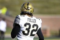 Vanderbilt place kicker Sarah Fuller warms up before the start of an NCAA college football game against Missouri Saturday, Nov. 28, 2020, in Columbia, Mo. (AP Photo/L.G. Patterson)