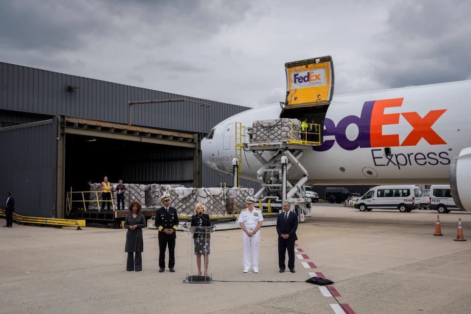 DULLES, VA - MAY 25: First Lady Jill Biden speaks as a FedEx cargo plane delivers baby formula at Dulles International Airport on May 25, 2022 in Dulles, Virginia. More than 100 pallets of infant formula traveled from Ramstein Air Base in Germany to Washington Dulles International Airport. The mission is being executed to address an infant formula shortage caused by the closure of the largest U.S. formula manufacturing plant due to safety and contamination issues. (Photo by Drew Angerer/Getty Images)