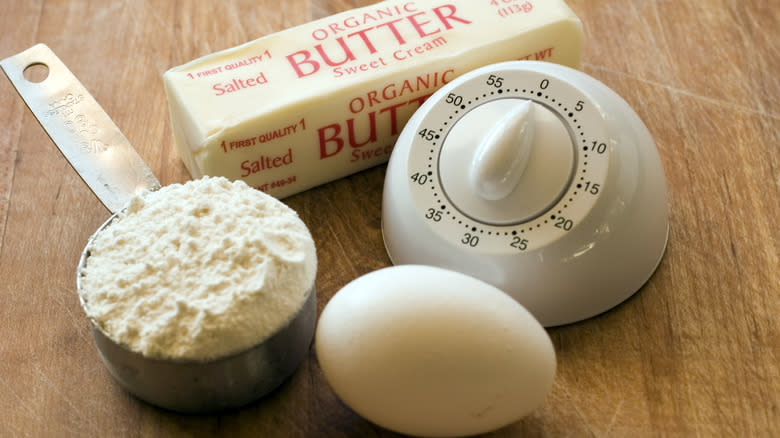 Kitchen timer with egg, flour, and butter