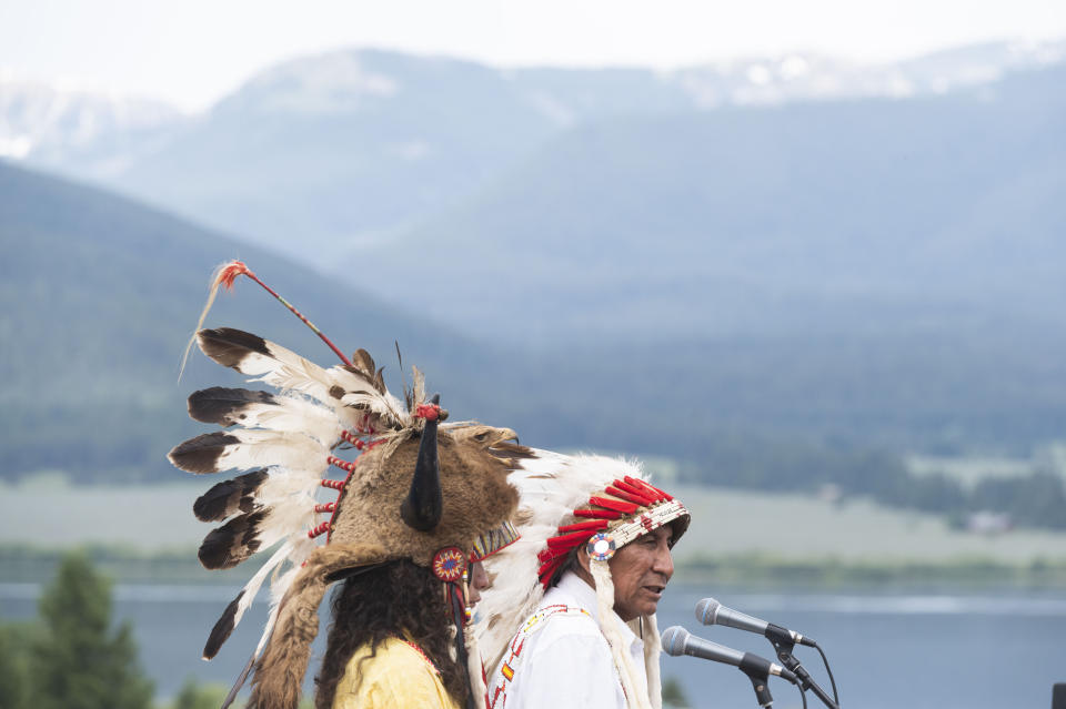 Arvol Looking Horse, a spiritual leader of the Lakota, Dakota and Nakota Oyate peoples in South Dakota, closes out a naming ceremony for a white buffalo calf at the headquarters of the Buffalo Field Campaign in West Yellowstone, Mont., Wednesday, June 26, 2024. The reported birth of the sacred calf in Yellowstone National Park fulfills a Lakota prophecy that portends better times. (AP Photo/Sam Wilson)