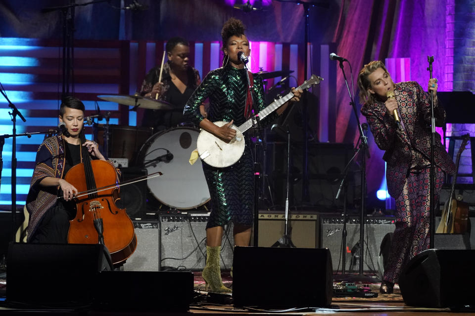 Larissa Maestro, left, Allison Russell, center, and Brandi Carlile, right, perform at the Americana Honors & Awards show Wednesday, Sept. 14, 2022, in Nashville, Tenn. (AP Photo/Mark Humphrey)