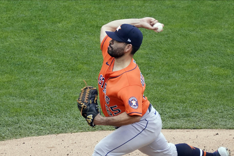 Houston Astros pitcher Jose Urquidy throws against the Minnesota Twins in the second inning of an American League wild-card series baseball game, Wednesday, Sept. 30, 2020, in Minneapolis. (AP Photo/Jim Mone)