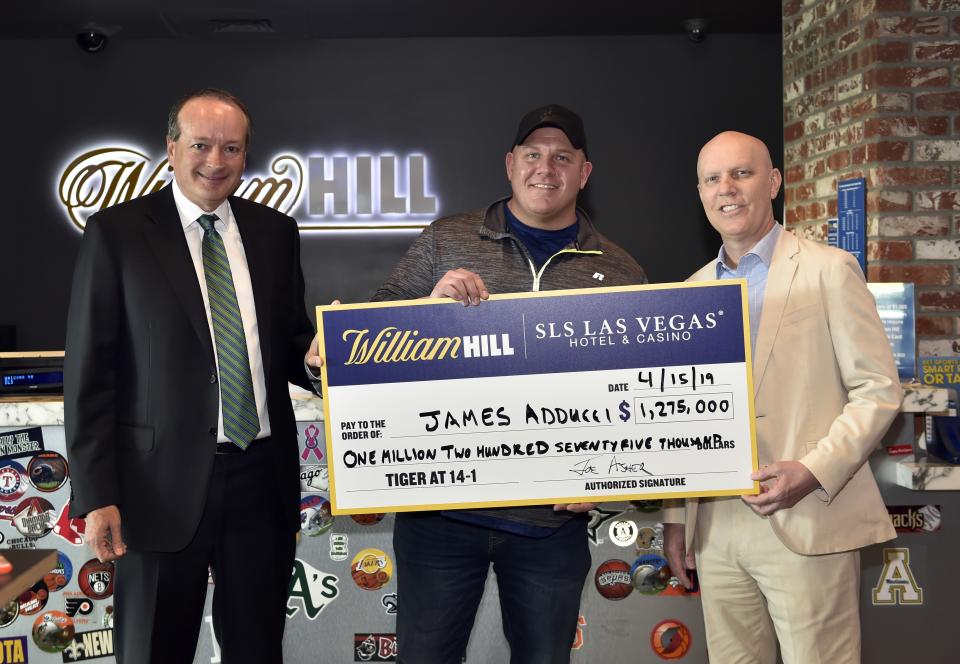 <h1 class="title">William Hill US Presents Bettor With $1.19M Check At William Hill Sports Book At SLS Casino After Tiger Woods' Masters Victory</h1><cite class="credit">(Photo by David Becker/Getty Images for William Hill US)</cite>