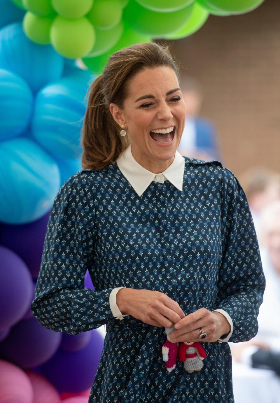 The Duchess rocking her power pony at afternoon tea earlier this week (Getty Images )