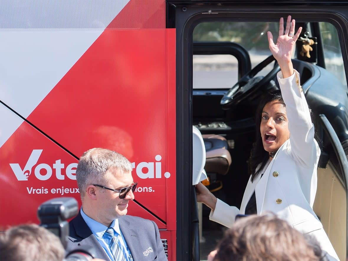 Quebec Liberal Party (QLP) Leader Dominique Anglade is seen here waving to supporters during a campaign stop in Montreal in late August. The QLP has raised less than any other major party so far in 2022 and just a fraction of the millions of dollars it attracted annually between 2003 and 2008. (Graham Hughes/The Canadian Press - image credit)