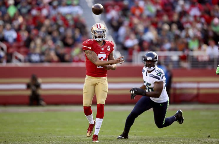 Colin Kaepernick might stop running from Seahawks and start playing for them. (Getty)