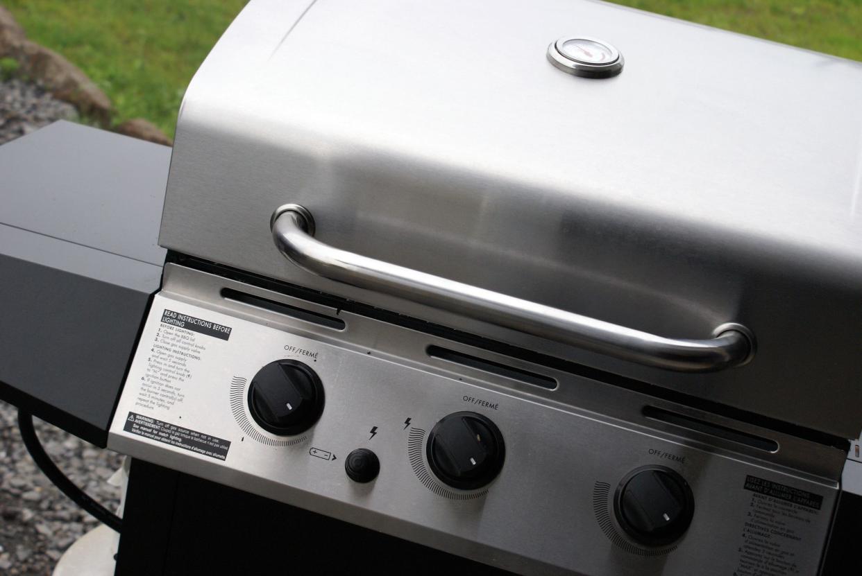 A brand new stainless steel bbq being used for the first time to welcome the summertime gatherings.