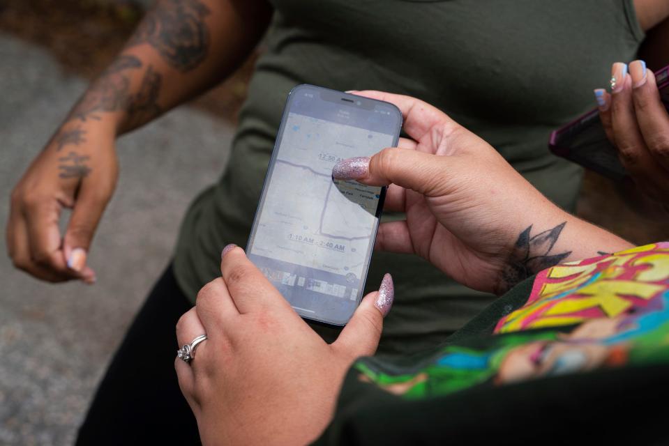 Mackenzie Winton, 27, of Lansing, shows a route on her cellphone that volunteer crews will canvass while searching for Wynter Cole Smith, 2, outside of the Lathrup Village Police Department on Wednesday, July 5, 2023. Smith was kidnapped from her Lansing home on July 2.