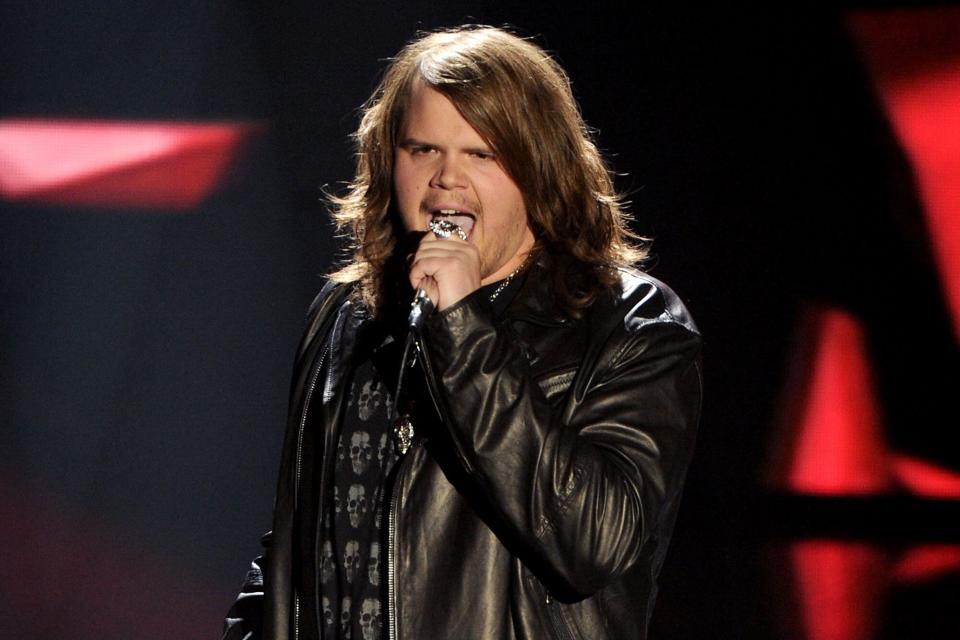 Contestant Caleb Johnson performs onstage at FOX's "American Idol XIII" Top 10 Live Performance Show on March 19, 2014 in Hollywood, California.