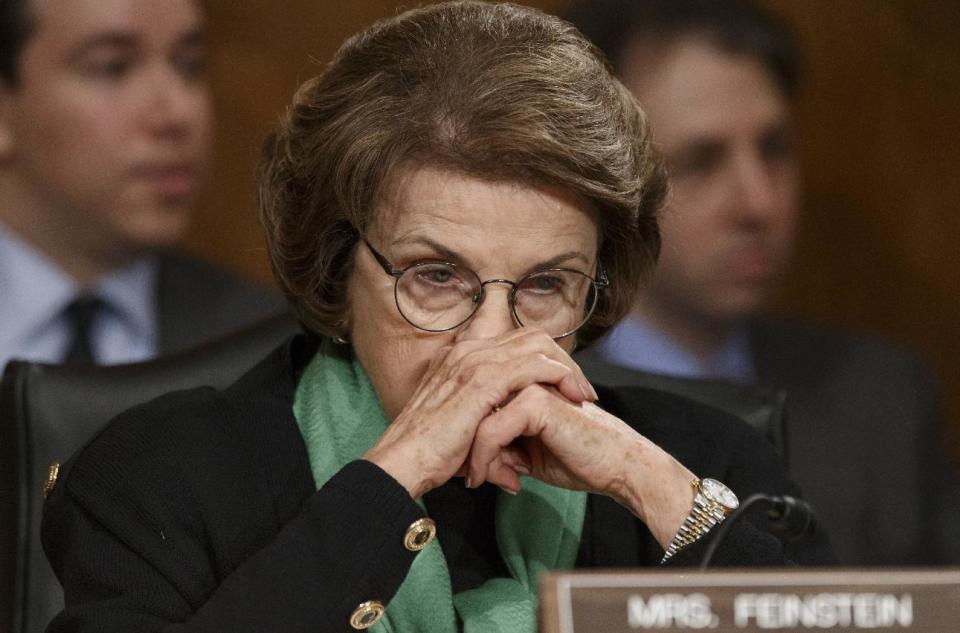 File- This March 13, 2014, file photo shows Senate Intelligence Committee Chair Sen. Dianne Feinstein, D-Calif., listening on Capitol Hill in Washington, during a Senate Transportation subcommittee hearing. In the aftermath of committee chairwoman Sen. Feinstein’s accusations that the CIA’s intimidating tactics and breaching of its constitutional authority for filing a criminal complaint against congressional aides, observers say the U.S. intelligence community and its congressional minders have committed serious missteps over the 13 years since the 9/11 terror attacks. (AP Photo/J. Scott Applewhite, File)