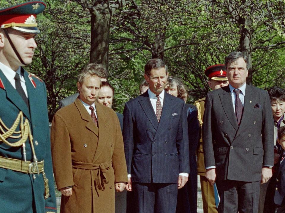 Vladimir Putin (second left), then-advisor to Anatoly Sobchak (R) with then-Prince Charles on May 17, 1994