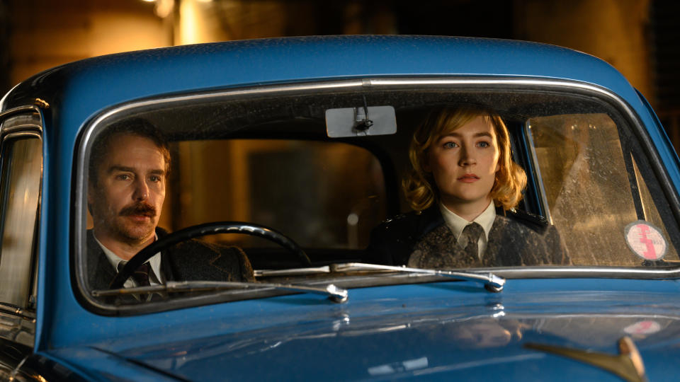 Sam Rockwell and Saoirse Ronan play cops on the trail of a murderer in See How They Run. (Searchlight Pictures)