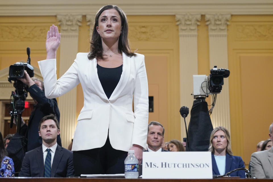 Cassidy Hutchinson, former aide to Trump White House chief of staff Mark Meadows, is sworn in to testify as the House select committee investigating the Jan. 6 attack on the U.S. Capitol continues to reveal its findings of a year-long investigation, at the Capitol in Washington, Tuesday, June 28, 2022. (AP Photo/Jacquelyn Martin)