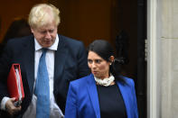 British foreign minister Boris Johnson and Britain's International Development Secretary Priti Patel leave the weekly meeting of the cabinet at 10 Downing Street in central London on January 31, 2017. / AFP / Glyn KIRK (Photo credit should read GLYN KIRK/AFP via Getty Images)