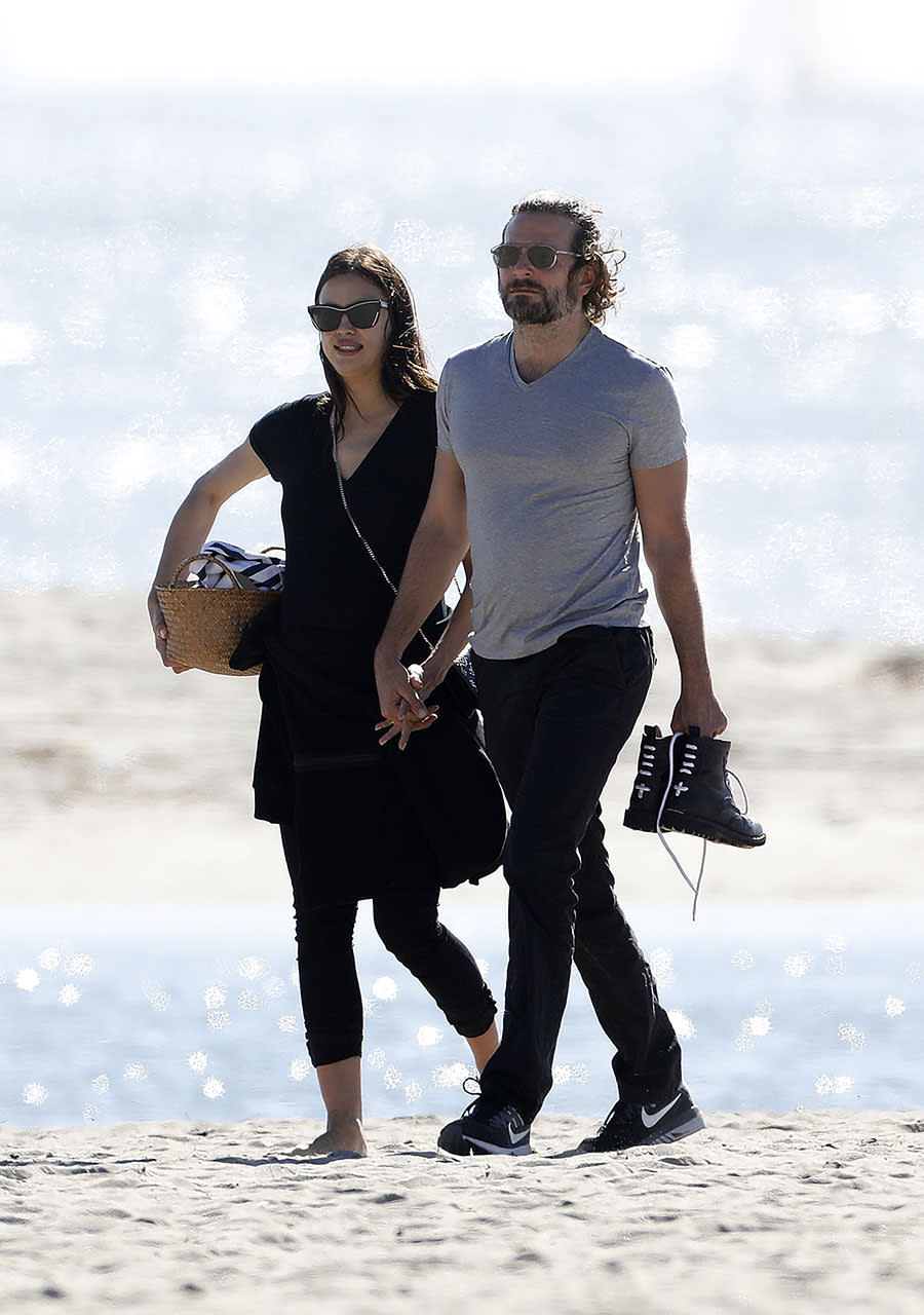 AG_677090 - ** RESTRICTIONS: WORLDWIDE EXCEPT IN ITALY, SPAIN **  -     *PREMIUM-EXCLUSIVE* **MUST CALL FOR PRICING** - Venice, CA - Bradley Cooper and Irina Shayk bring their own lunch to the beach and cuddle after enjoying their meal. The couple look sweet and in love as Bradley helps Irina stand up so they can leave hand in hand.Pictured: Bradley Cooper, Irina ShaykAKM-GSI 14 FEBRUARY 2017 Maria Buda(917) 242-1505mbuda@akmgsi.com Mark Satter(317) 691-9592msatter@akmgsi.com or sales@akmgsi.com