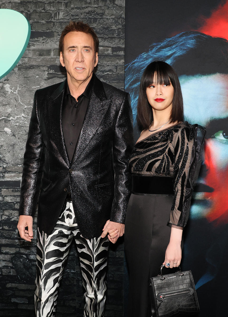 Nicolas Cage and Riko Shibata attend the ‘Renfield’ premiere at the Museum of Modern Art in New York City on March 28, 2023.