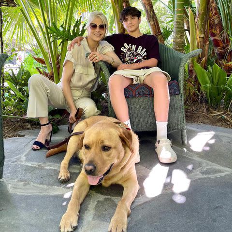 <p>Selma Blair/Instagram</p> Selma Blair and her son Arthur pose for a photo with her service dog Scout
