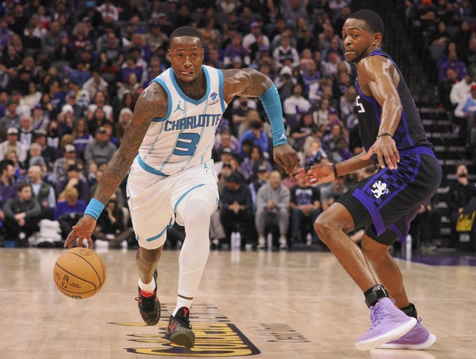 Charlotte Hornets guard Terry Rozier (3) controls the ball against Sacramento Kings guard De’Aaron Fox (5) during the fourth quarter at Golden 1 Center. Kelley L Cox/USA TODAY NETWORK
