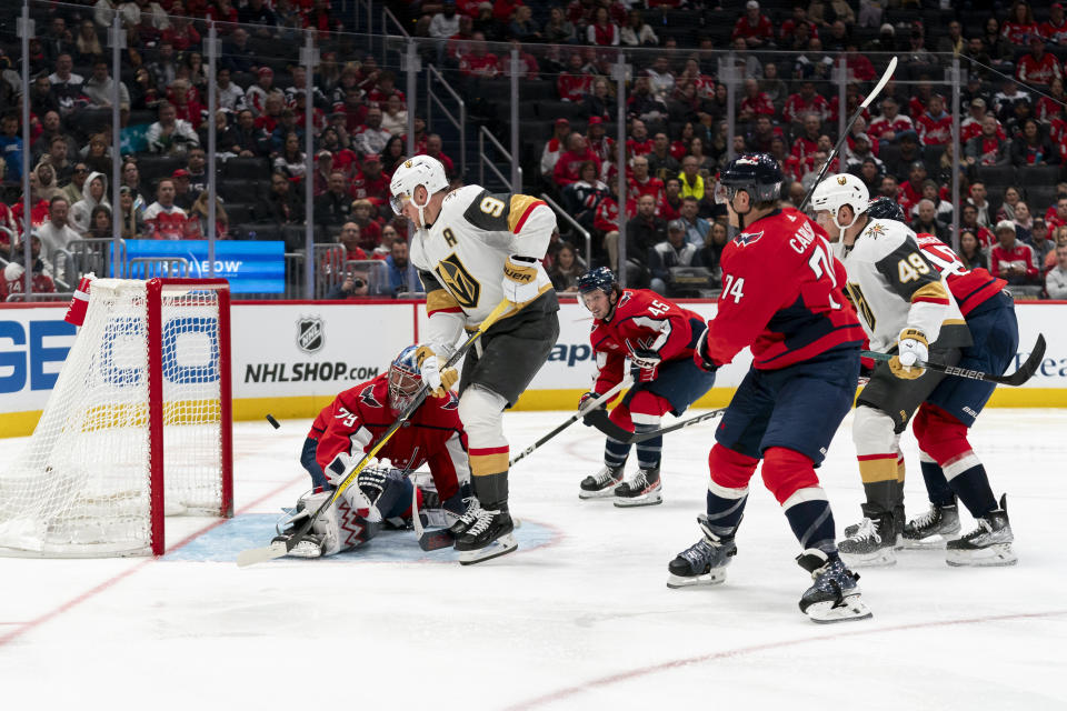 Washington Capitals goaltender Charlie Lindgren (79) defends the net against Vegas Golden Knights center Jack Eichel in the second period of an NHL hockey game, Tuesday, Nov. 14, 2023, in Washington. (AP Photo/Stephanie Scarbrough)