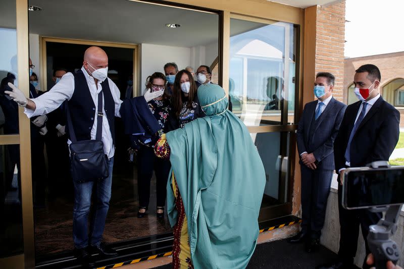 Freed Italian aid worker Silvia Romano arrives at Ciampino military airport in Rome