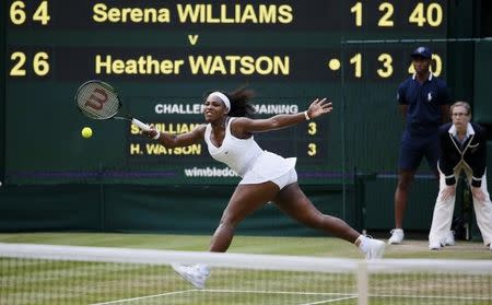 Serena Williams of the U.S.A. hits the ball during her match against Heather Watson of Britain at the Wimbledon Tennis Championships in London, July 3, 2015. REUTERS/Stefan Wermuth