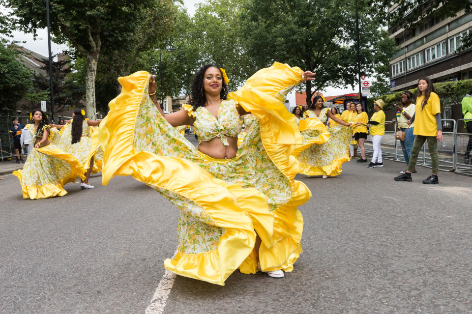 <p>The grand finale of the Notting Hill Carnival, during which performers present their costumes and dance to the rhythms of the mobile sound systems or steel bands along the streets of West London. (Photo: Wiktor Szymanowicz / Barcroft Media via Getty Images) </p>