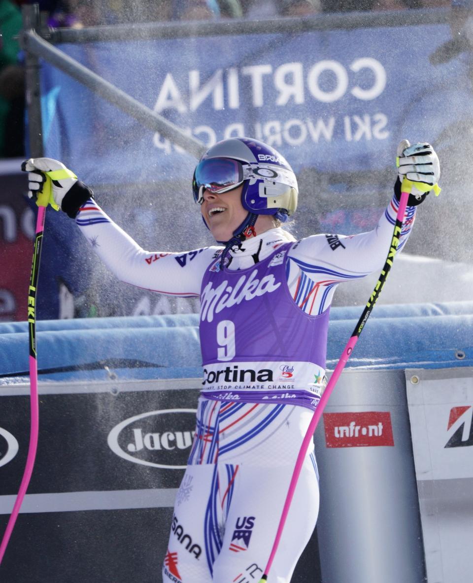 United States' Lindsey Vonn smiles at the finish area of an alpine ski, women's World Cup downhill in Cortina D'Ampezzo, Italy, Saturday, Jan. 19, 2019. (AP Photo/Giovanni Auletta)