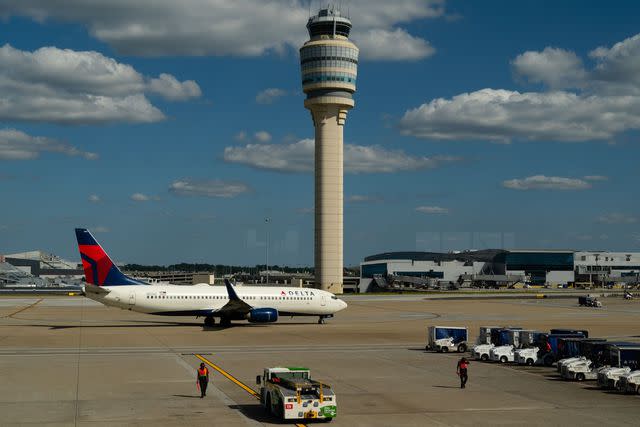 <p>Elijah Nouvelage/Bloomberg via Getty</p> The air traffic control tower at Hartsfield-Jackson Atlanta International Airport (ATL) in Atlanta