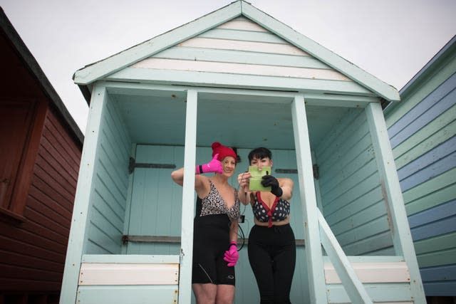 Swimmers at Thorpe Bay near Southend in Essex