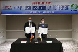 John Christensen, USA President & CEO, and Dr. Jae Hoon Chung, KHNP President & CEO, signed an agreement Dec. 3 to work together to support the nuclear power industry. USA and KHNP will cooperate in the development of innovative solutions to enhance nuclear power plant safety and performance within the USA fleet and in the broader international commercial nuclear power industry.