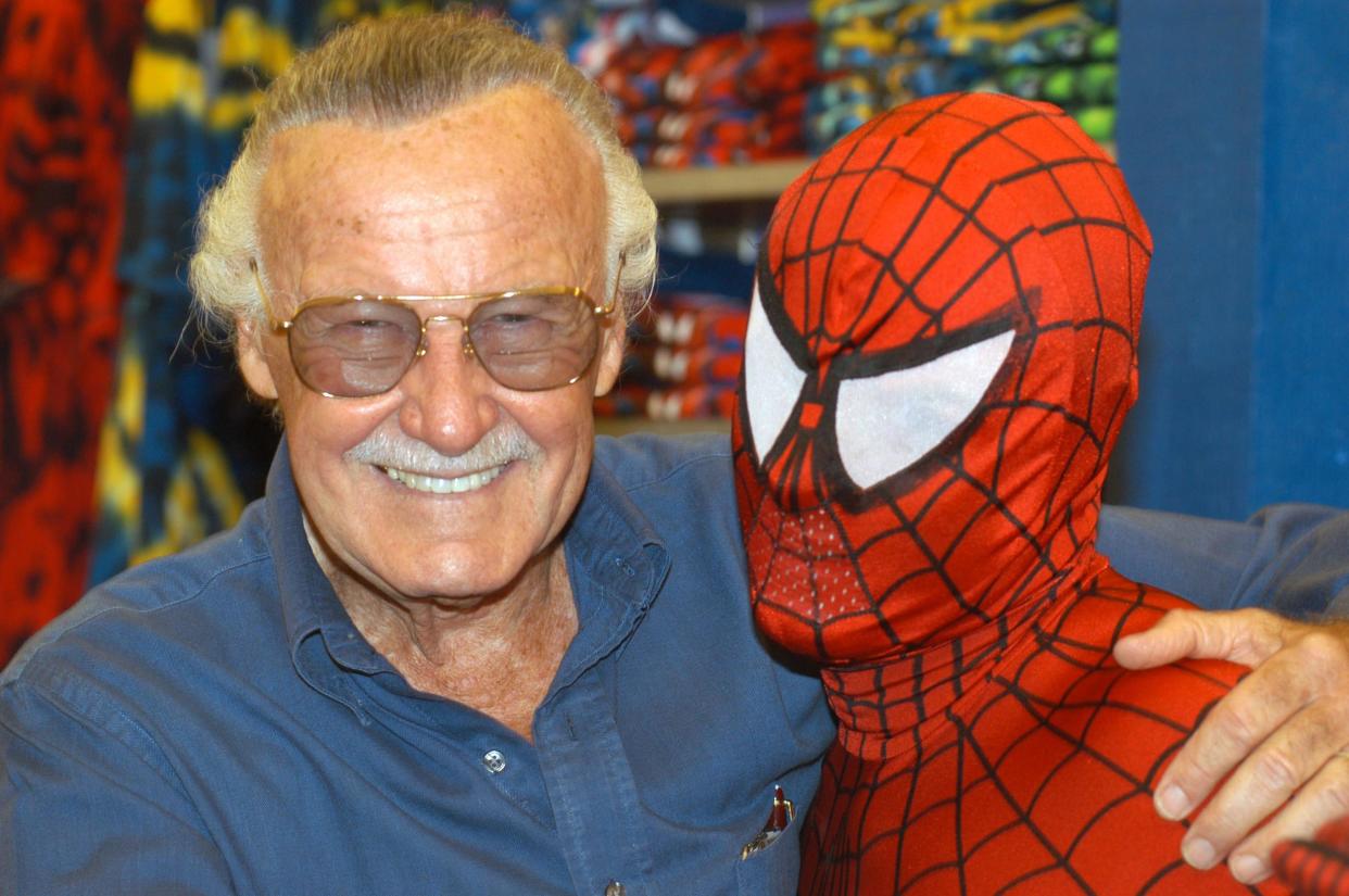 Stan Lee (L) poses with Spider-Man during the Spider-Man 40th Birthday celebration at Universal Studios on August 13, 2002: Getty
