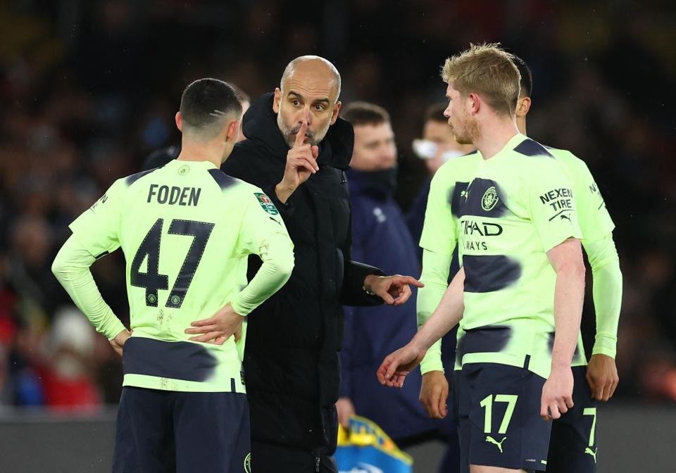 Manchester City manager Pep Guardiola gives instructions to his players during their Carabao Cup defeat by Southampton.