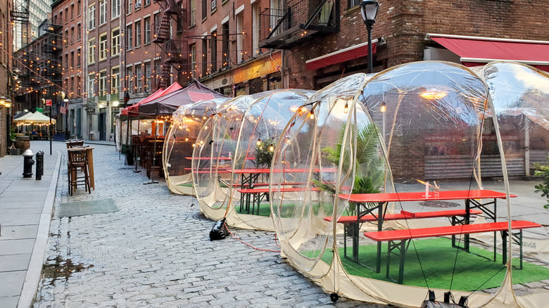 Restaurant tables in bubbles