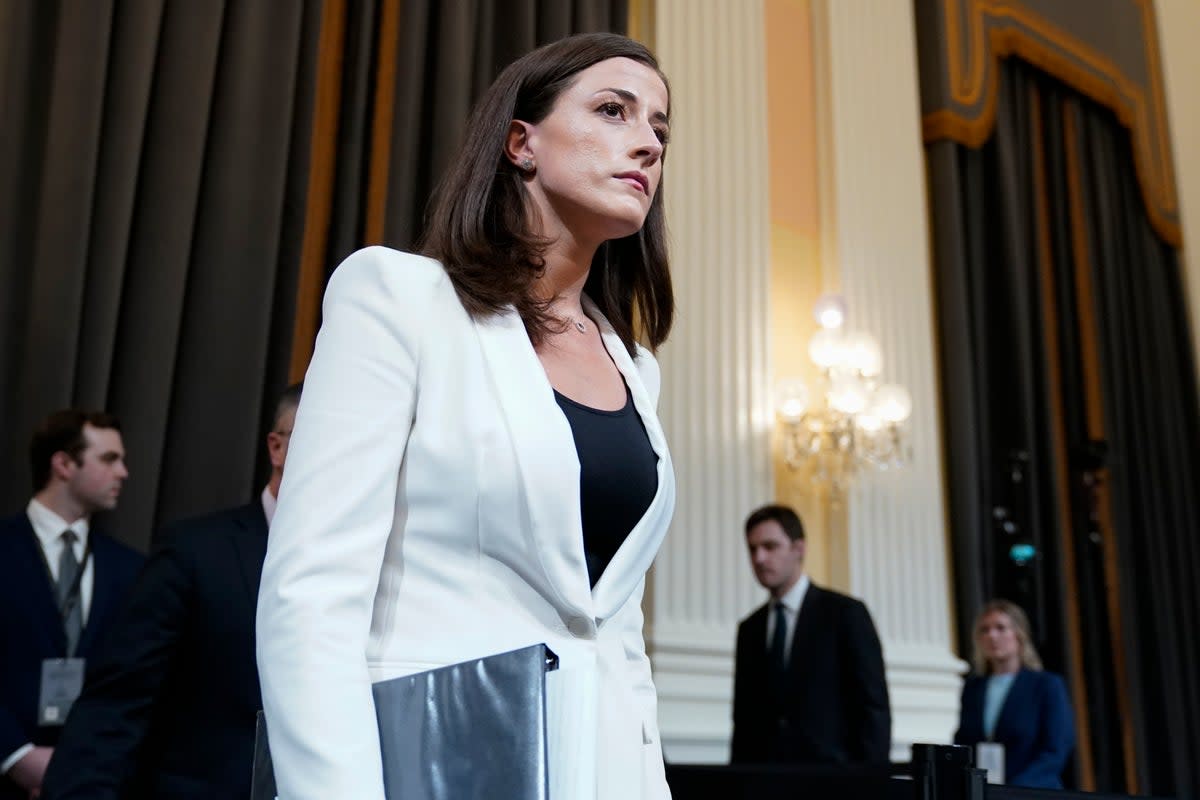 Cassidy Hutchinson, former aide to Trump White House chief of staff Mark Meadows, arrives after a break as the House select committee investigating the Jan. 6 attack on the U.S. Capitol holds a hearing at the Capitol in Washington, Tuesday, June 28, 2022 (AP)