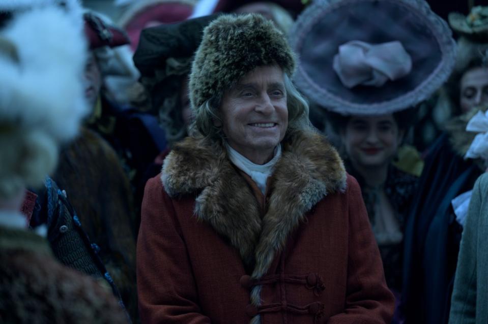 The French people were so enamored with the celebrity of Ben Franklin (Michael Douglas) that they copied his fur cap. Courtesy of Apple