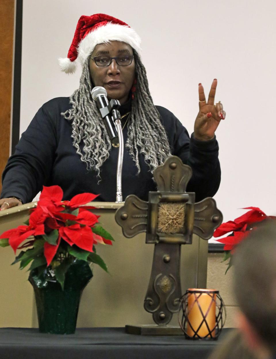 Shaaron Funderburk, with Off The Streets Ministries, talks about suffering loss during a a National Homeless Person’s Memorial Day Service held Wednesday morning, Dec. 21, 2022, at First United Methodist Church in Gastonia.