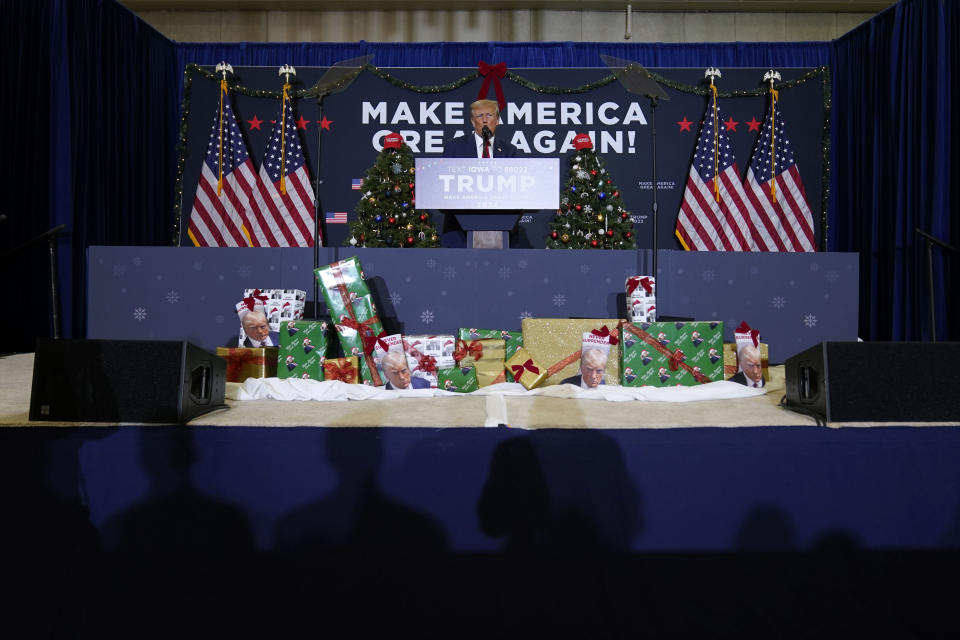 FILE - Former President Donald Trump speaks during a commit to caucus rally, Tuesday, Dec. 19, 2023, in Waterloo, Iowa. The field of 2024 presidential candidates may have some options for shoppers scrambling for a last-minute holiday gift. As the campaign for the White House kicks into full gear, the contenders are offering an onslaught of holiday-themed merchandise, many of which capture some of the surreal aspects of the 2024 race. (AP Photo/Charlie Neibergall, File)