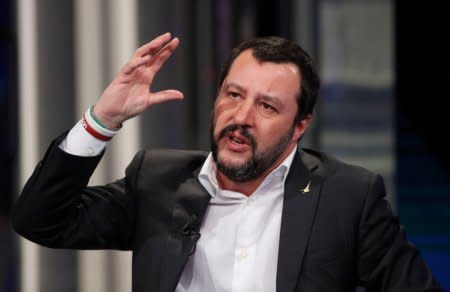 FILE PHOTO: Northern League leader Matteo Salvini gestures during the television talk show