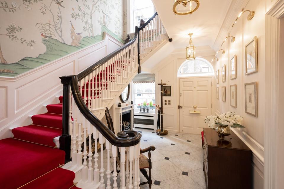 Hand-painted silk wallpaper and marble in the entrance hall (Purplebricks)