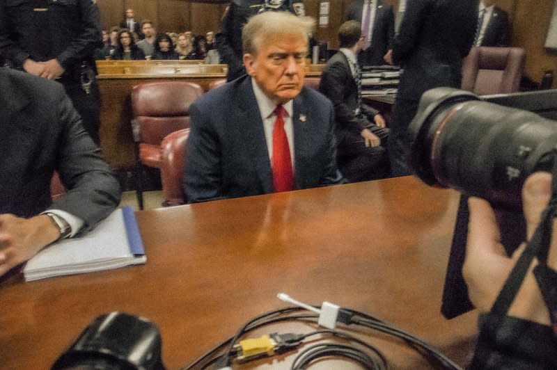 Former President Donald Trump sits in the courtroom as he waits for the start of his criminal trial at Manhattan Criminal Court in New York on Tuesday. Pool photo by John Taggart/UPI