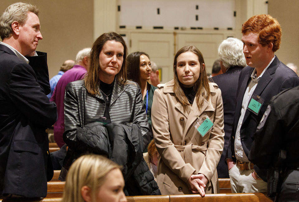 John Marvin Murdaugh and his wife Liz Murdaugh, Brooklynn White and Buster Murdaugh, from left, attend the opening day of Alex Murdaugh's double murder trial at the Colleton County Courthouse in Walterboro, S.C, Wednesday, Jan. 25, 2023. (Grace Beahm Alford/The State via AP)