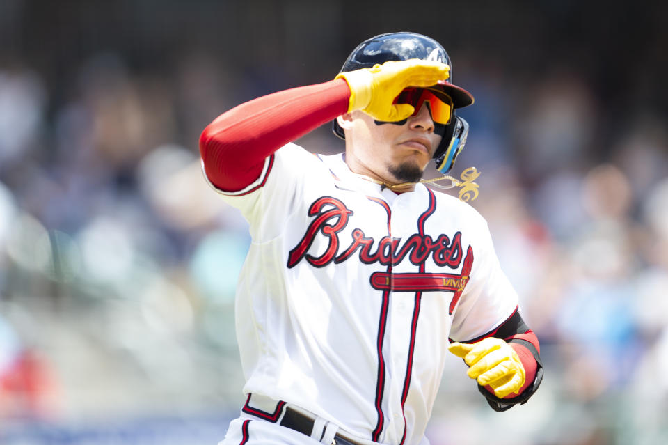 Atlanta Braves' William Contreras gestures to crowd after solo home run in the second inning of a baseball game against the Pittsburgh Pirates, Sunday, June 12, 2022, in Atlanta. (AP Photo/Hakim Wright Sr.)