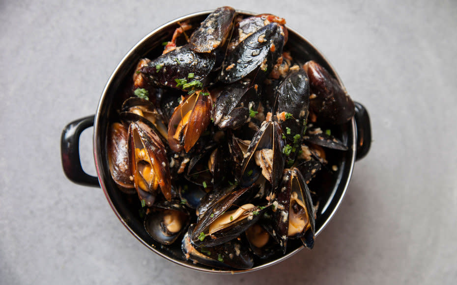 <p>Arbors brunch menu ranges from fluffy French toast with mixed berries and lemon pepper to <em>moules frites</em> (pictured) that are cooked to perfection in sweet vermouth, garlic butter, and tomato confit.</p>